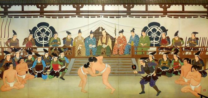 織田信長が1578年に安土城で行った相撲大会の想像図（両国国技館の壁画）。信長の左右に描かれているのは息子たちか