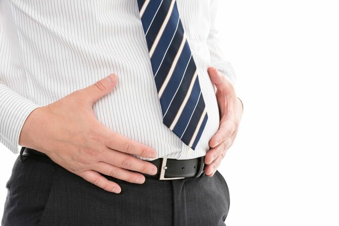 太ったビジネスマンのお腹